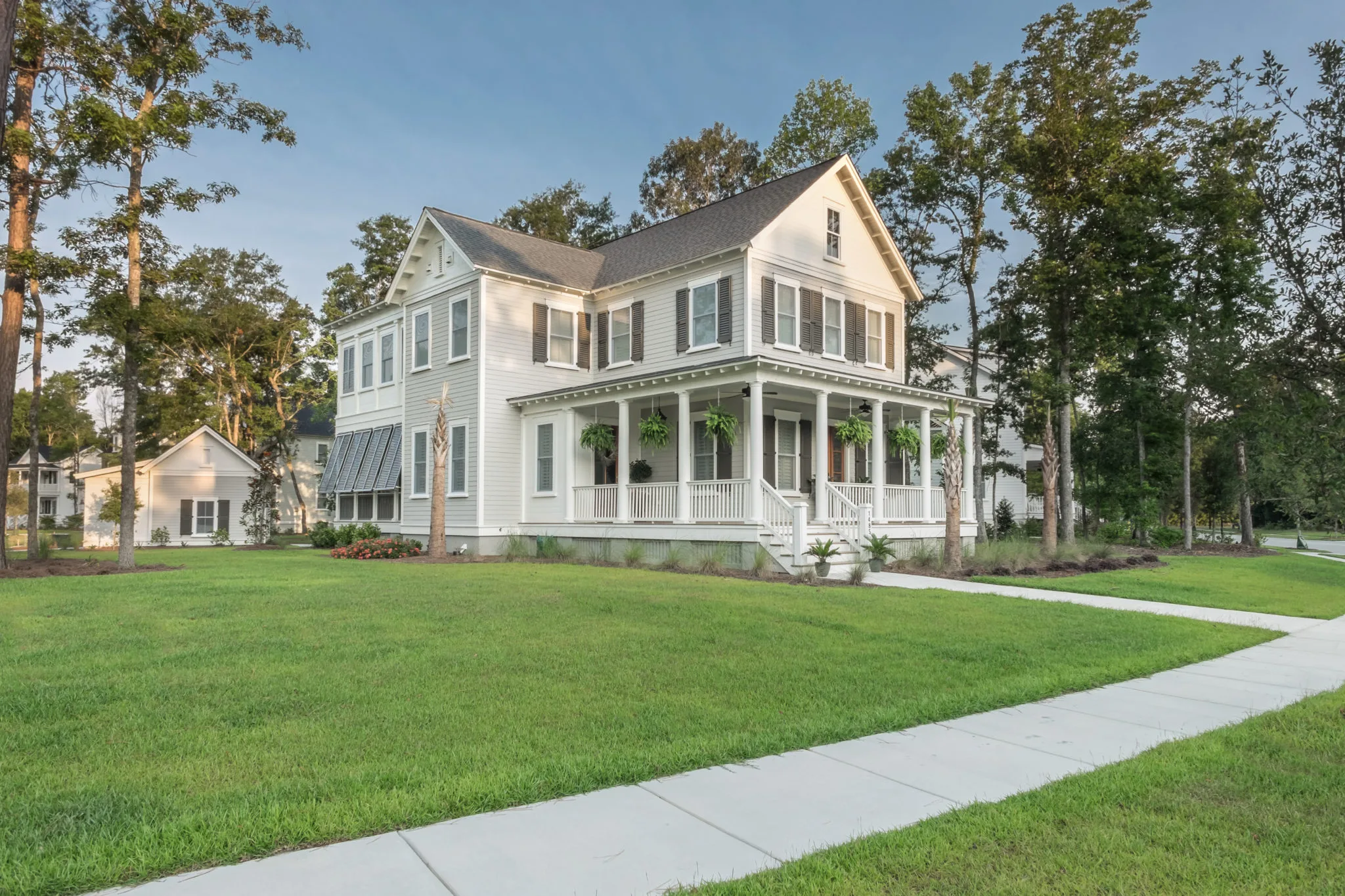 custom home with wraparound front porch